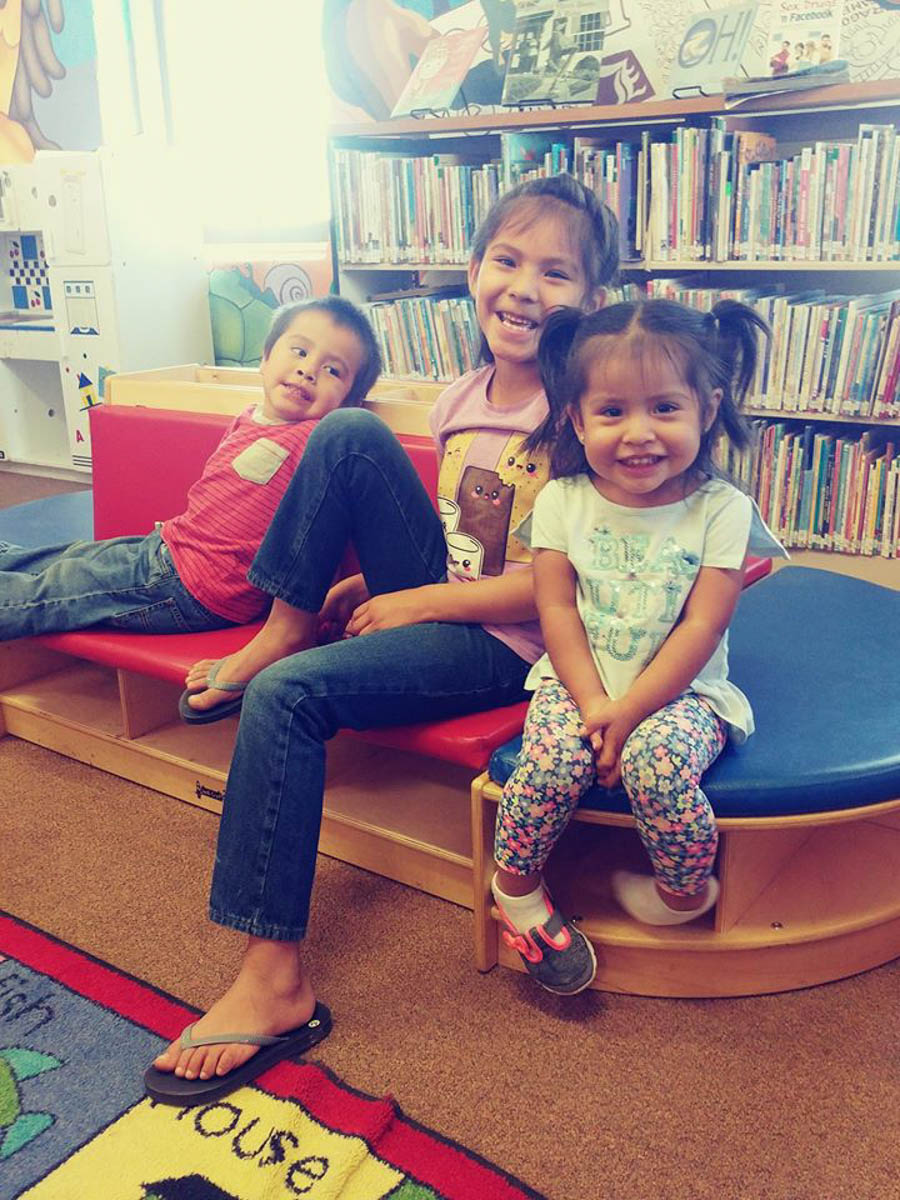 Read at Home kids in library.